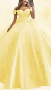 This yellow quinceañera dress features an off-the-shoulder sweetheart neckline adorned with intricate floral appliqués, enhancing the fitted bodice. The voluminous skirt flows into a full-length design, showcasing delicate lace details that add texture and elegance, while the soft yellow hue creates a radiant and cheerful aesthetic.