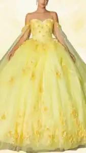 This yellow quinceañera dress features a sweetheart neckline and off-the-shoulder sleeves adorned with delicate floral embroidery. The voluminous ball gown silhouette is complemented by layered tulle, showcasing intricate yellow and cream floral appliqués throughout the skirt. The soft, sunny yellow hue is highlighted with shimmering detailing, creating a stunning, ethereal look.