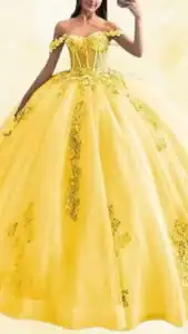 This yellow Quinceañera dress features an elegant strapless sweetheart neckline with delicate off-shoulder sleeves. The floor-length ball gown silhouette is adorned with intricate gold floral embroidery, highlighting its voluminous tulle skirt and creating a standout, ethereal look. The vibrant yellow is complemented by subtle shimmering accents, enhancing the overall luxurious appearance.